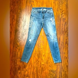 WHBM distressed jeans with floral detail